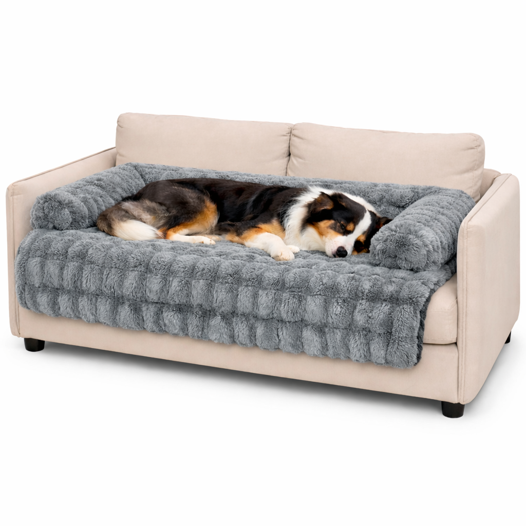 Dog resting on the grey Hush calming dog sofa protector