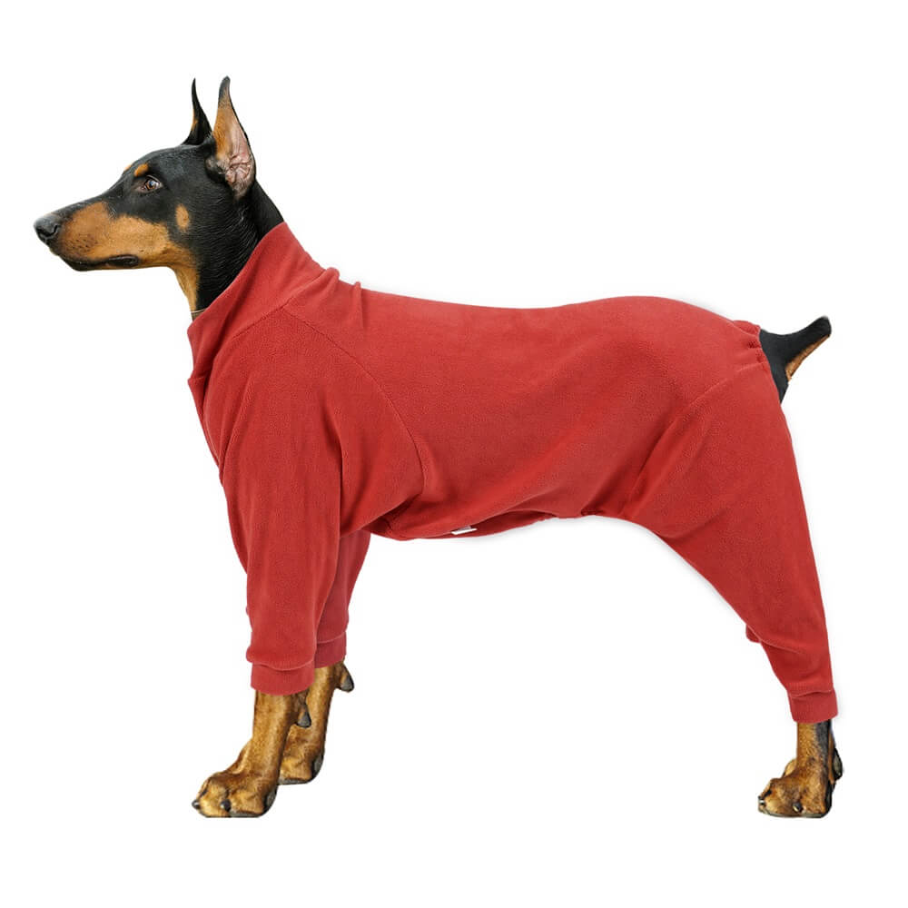 Doberman wearing the red fleece dog pajamas, side view