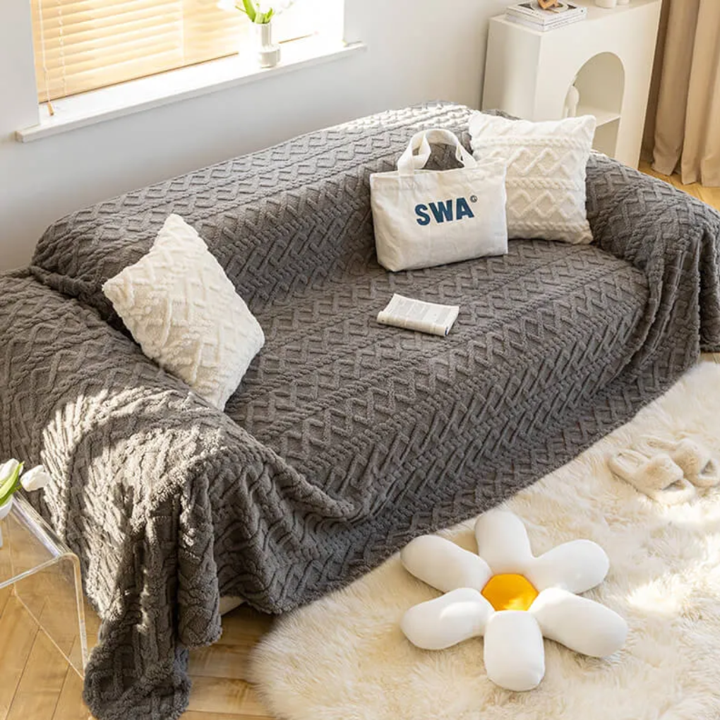 Hearth fleece sofa cover in Gray on a living-room sofa