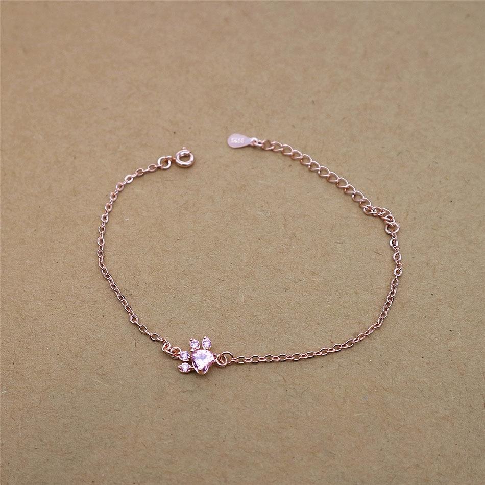 Adjustable clasp detail of the rose quartz paw print bracelet