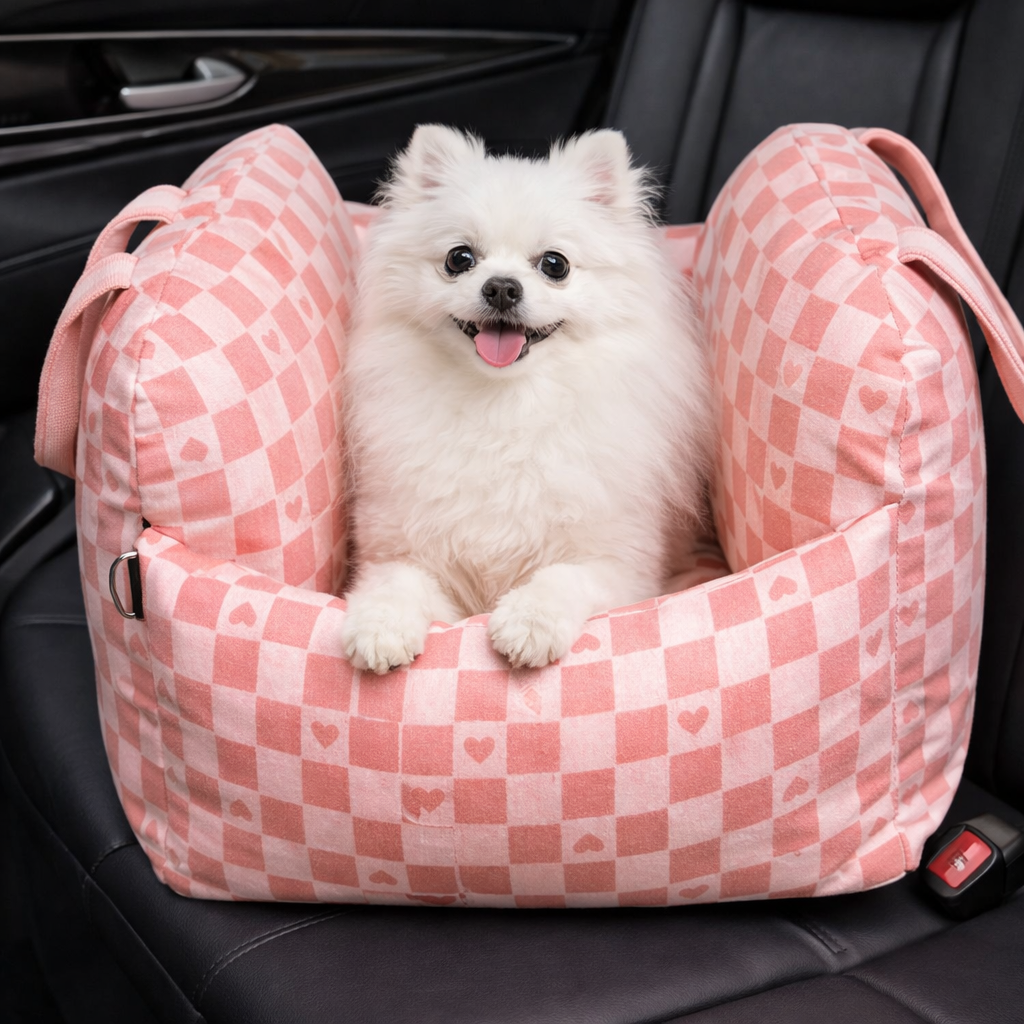 Pink heart-pattern Roam Waterproof Dog Car Seat Bed with a Pomeranian sitting inside
