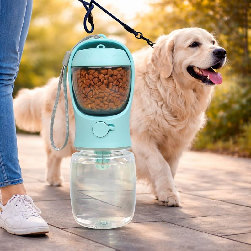 Woman walking her golden retriever with the Sip portable dog water bottle