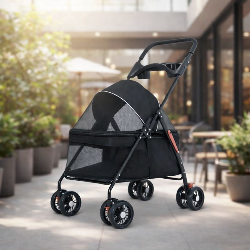 Black Wander Foldable Dog Stroller parked on a patio