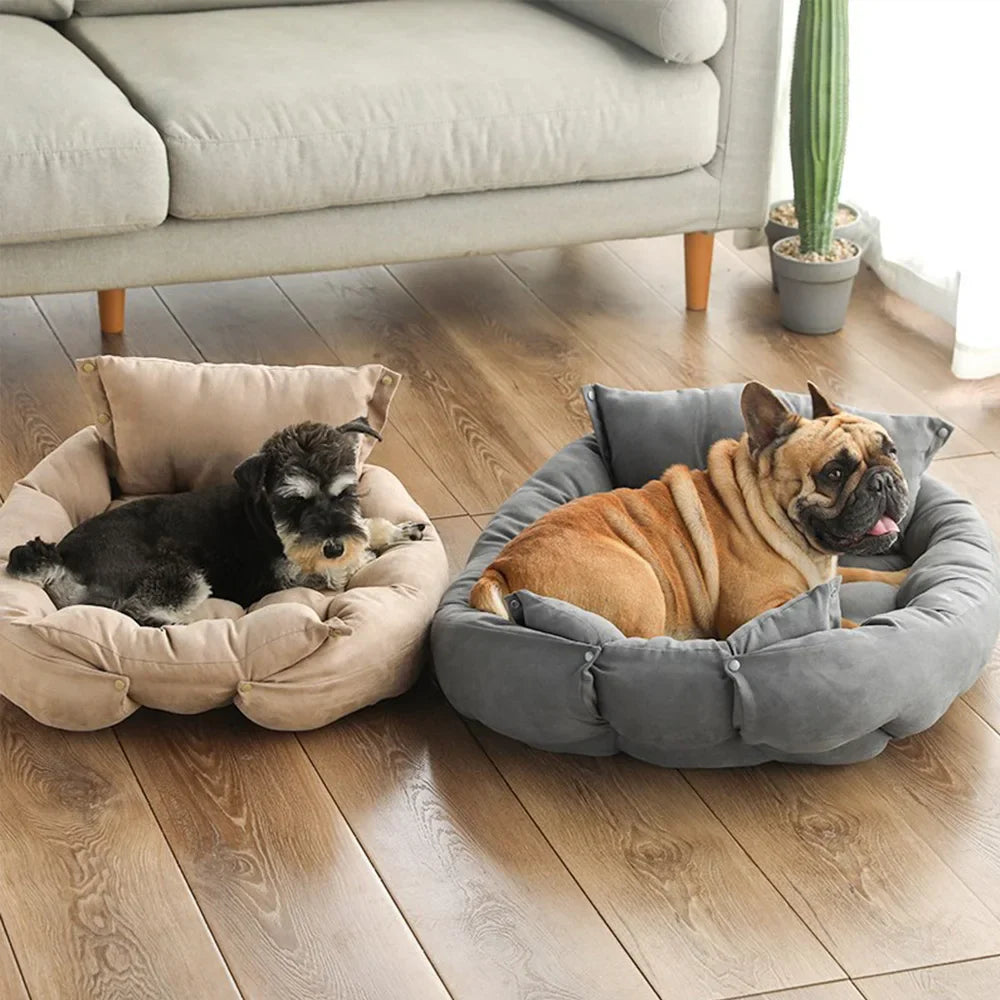 Two dogs resting in Nuzzinel Trio bolstered dog beds