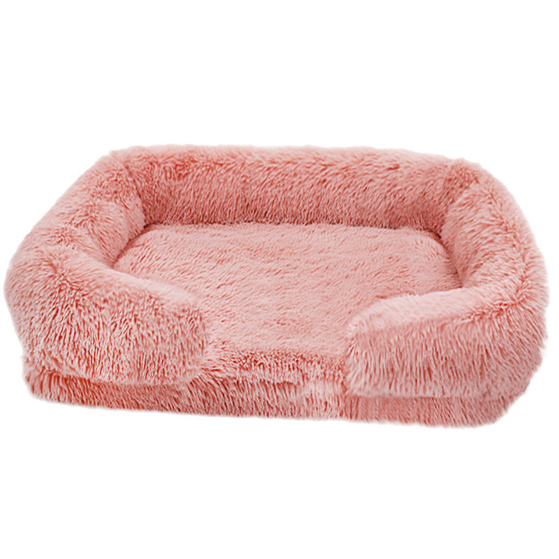 Light pink Nuzzinel Biscuit calming sofa dog bed