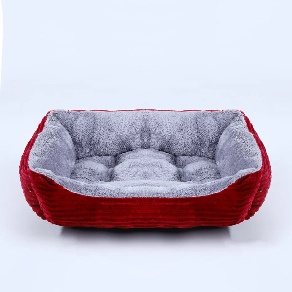 Nuzzinel Puff calming bolster dog bed in red