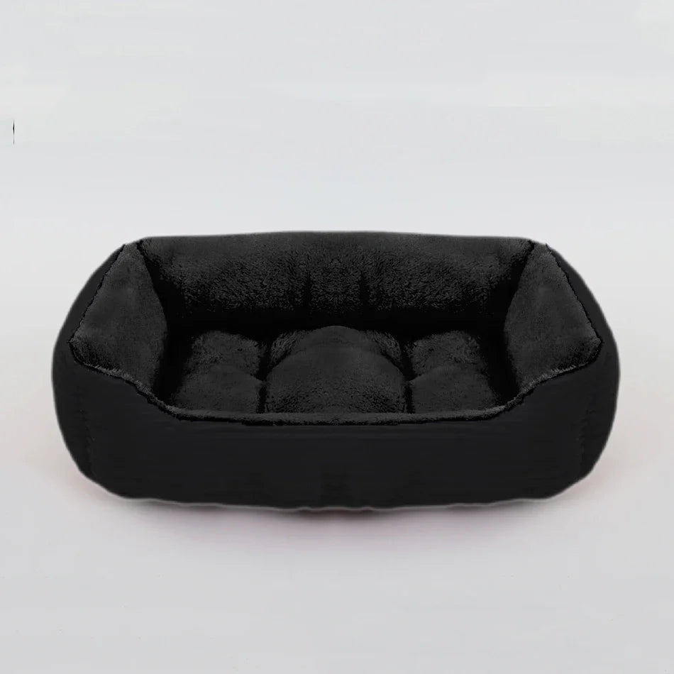 Nuzzinel Puff calming bolster dog bed in black