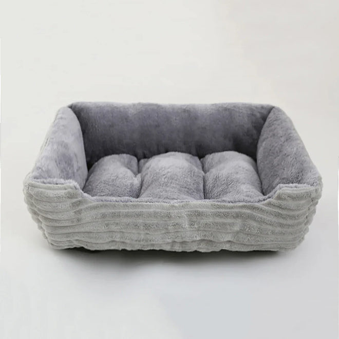 Nuzzinel Puff calming bolster dog bed in grey
