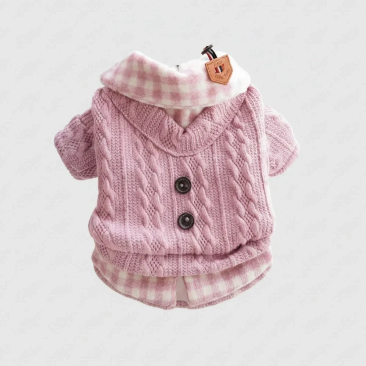 Pink cable-knit dog sweater with gingham plaid collar and button details