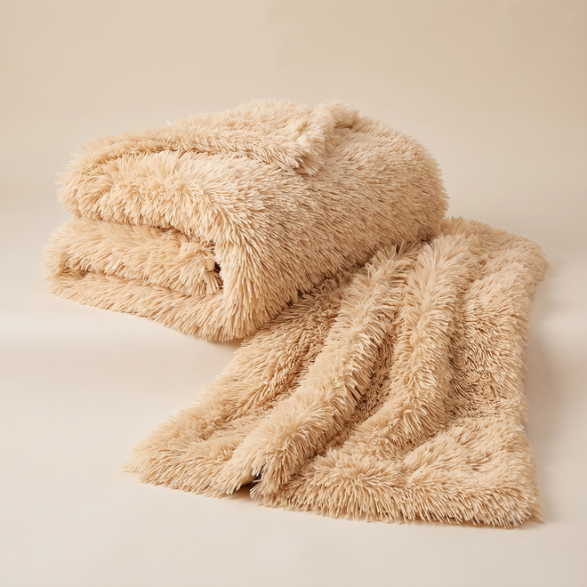 Cocoon Cozy Plush Dog Blanket in apricot, soft long-pile faux fur folded and draped