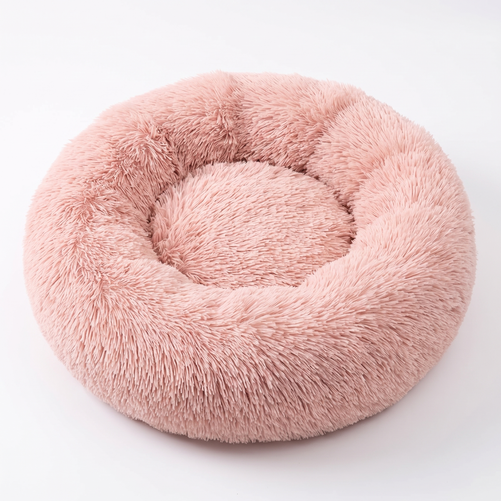 Cloud calming donut dog bed in Pink