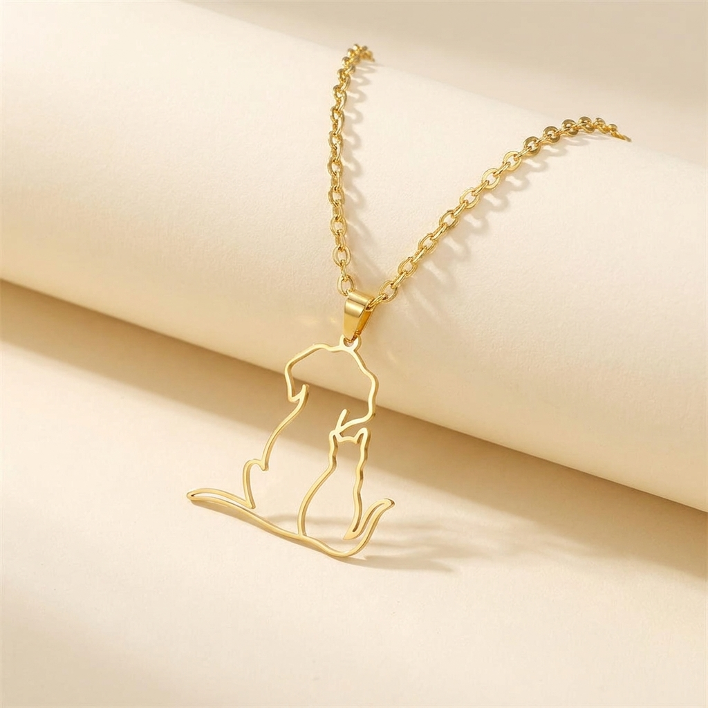 Gold dog and cat outline pendant necklace on a delicate chain