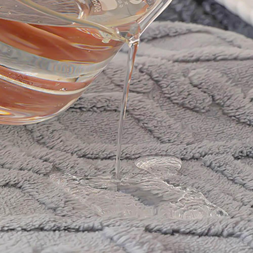 Water beading off the waterproof dog blanket surface