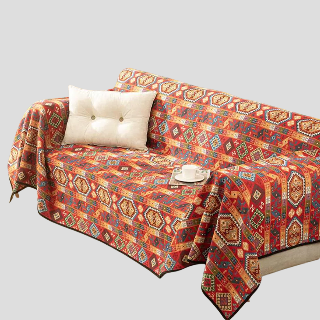 Moroccan jacquard dog throw blanket draped over a sofa