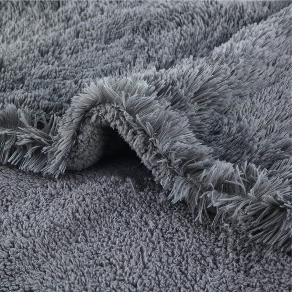 Close-up of the ultra-soft shaggy plush blanket texture