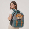 Owner wearing the Scout dog carrier backpack with a small dog riding inside