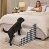 Dog climbing the blue checkered Hop Foam Dog Stairs onto the bed