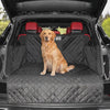Dog settling onto the Roadie waterproof SUV cargo liner