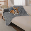 Drift Waterproof Pet Blanket — a corgi settling cozily onto the soft blanket on the sofa