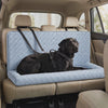 A harnessed dog riding securely on the Nestle dog car seat bed