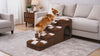 Small dog climbing the Rook checkered dog stairs to the sofa