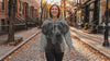 Woman wearing the Great Dane Big Face Hoodie on an autumn street
