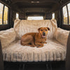 Dog settling onto the Nuzzinel Cabana faux-fur car seat cover