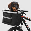 Small dachshund riding happily in the Copilot front bike basket